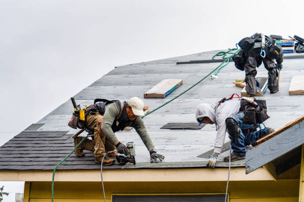 Professional Emergency Roof Repair technician working in Kenyon, RI